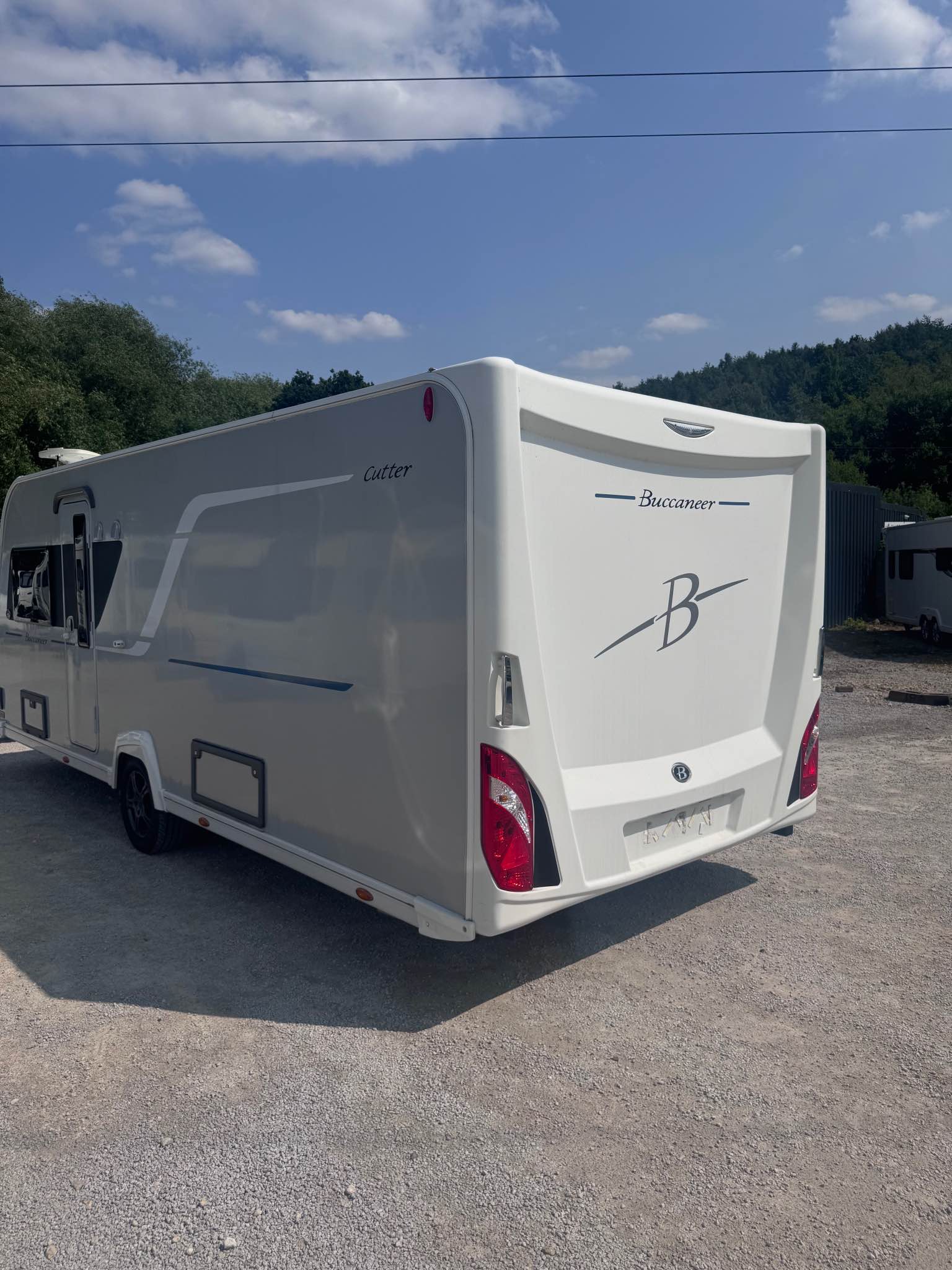 May be an image of van and text that says "Buccaneer Duccaneer- هر ا"